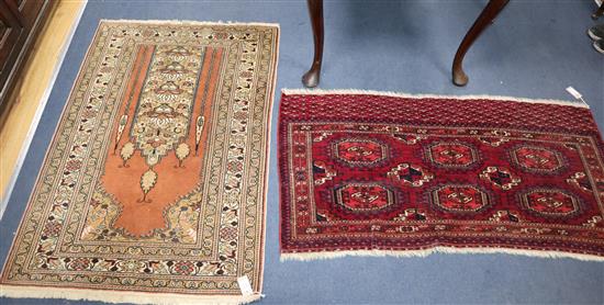 A Bokhara rug and a prayer rug Larger 132 x 94cm